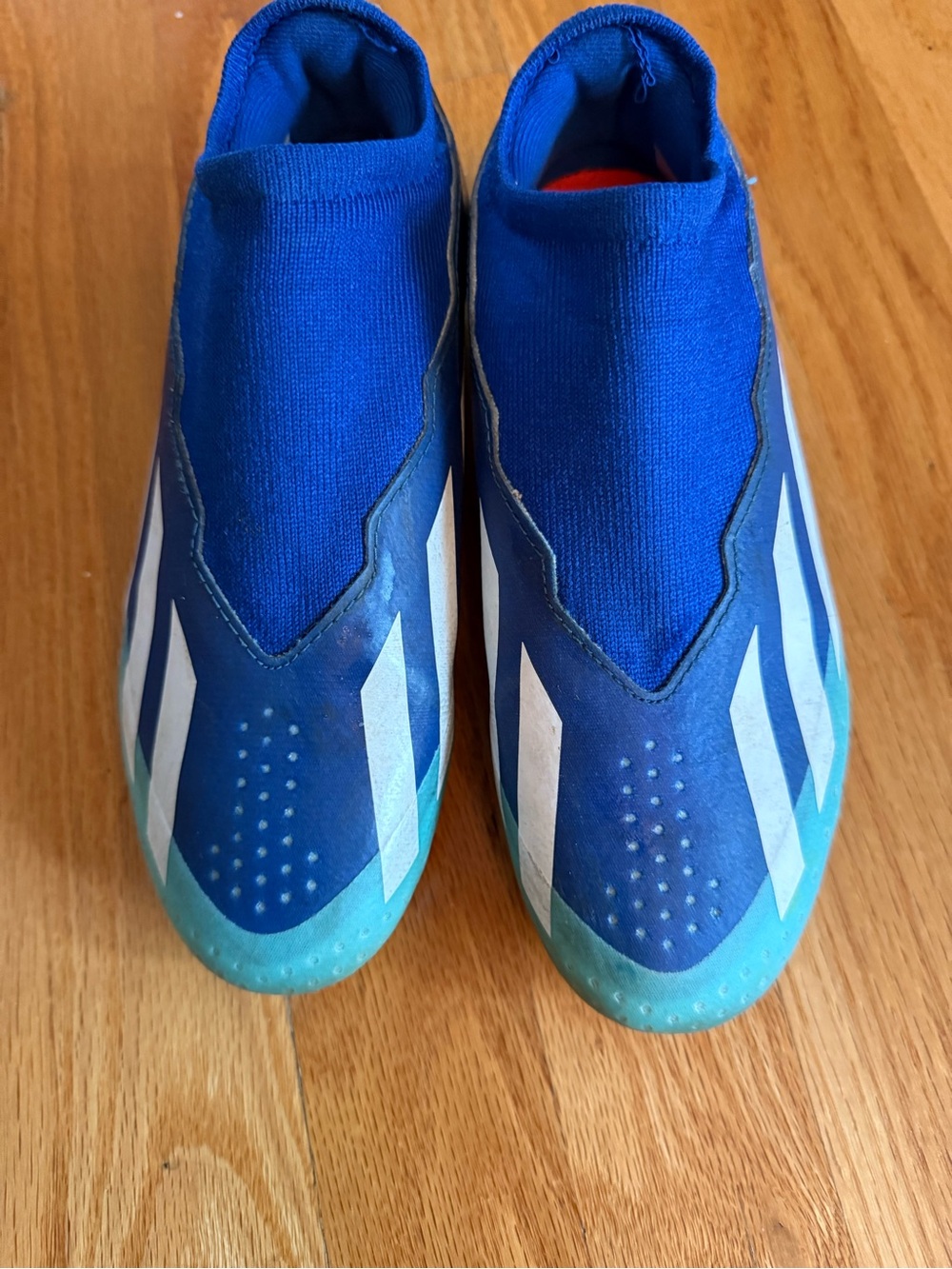 adidas Kids Royal Blue Slip-On Soccer Cleats with White Stripes